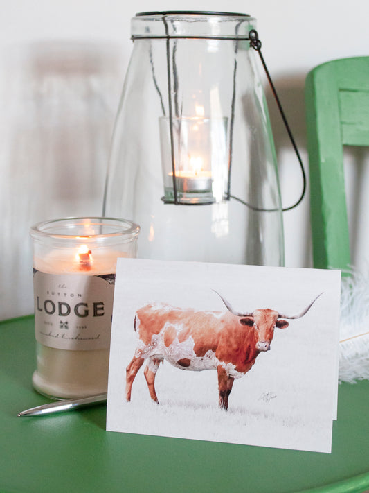 This product is a longhorn heifer cow on a folded notecard greeting card and is a set of 10. This Longhorn heifer is printed on 14 pt. cardstock matte paper. Cow art. Cow photography. Cow artwork. Cow wall art. Cow prints. Cow canvases. Cow gifts. Animal photography.